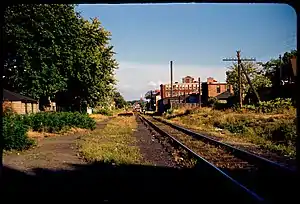 A single-track railway line in an urban area