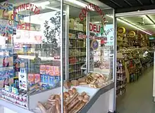 Deli window displaying breads and other foods