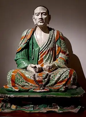 Statue of the luohan Tamrabhadra, one of the group of glazed pottery luohans from Yixian; 10th–13th century; glazed terracotta; height: 123 cm; Guimet Museum (Paris)