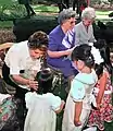 Columba Bush, Donna Lou Askew, and Rhea Chiles greeting children at the Florida Governor's Mansion