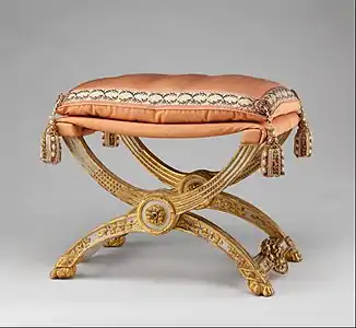 Louis XVI style folding stool (pliant); 1786; carved and painted beechwood, covered in pink silk; 46.4 × 68.6 × 51.4 cm; Metropolitan Museum of Art