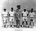 1970 Parsons football coaching staff.  L-R, Tom Schlarbaum, Def. Line, Larry Blixt, Off. Backs, Dr. John Wahrer, AD, Frank Falks, Off. Coordinator/Line, Paul Read, HC/Defense Coord