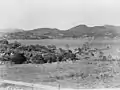 Port Henry from Fort St. Frédéric, Crown Point. Photograph shows view across Lake Champlain at hills in the distance on December 23, 1902.