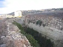 Looking down the left hand ditch of the battery, with the left caponier nestling in the ditch.