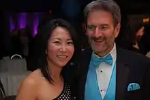 Frank Murphy posing for a photo with Hana Kim