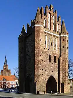 Gothic Neubrandenburg Gate with the Church of the Virgin Mary in the background