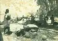 Ready for the journey. Goods on the beach prepared to be loaded on the boat. The bundle of the trader's bedding is on top of the heap. Fuvahmulah, 1981.