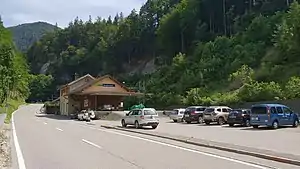 Two-story building with gabled roof sitting in a valley