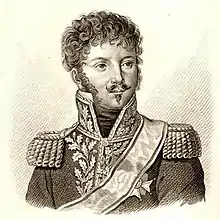 Black and white print of a curly-haired man with a moustache and Van Dyke beard. He wears a dark Napoleonic era general's uniform with epaulettes and a high collar with gold lace.