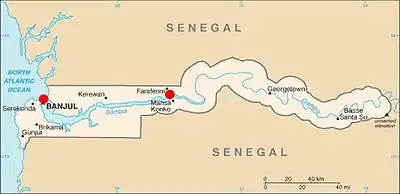 A map of The Gambia indicating the locations in the west and center where travellers may cross in order to arrive at Carabane