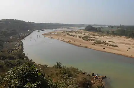 Tourists on the banks of Shilabati on New Year's Eve.