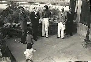 Gautam Sarabhai wearing half shirt and tie, third from the left standing next to his father Ambalal Sarabhai