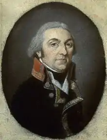 Color oval portrait of a gray-haired man in a dark blue military coat with a red collar