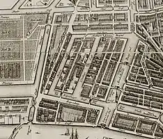 Detail of 1737 map, looking south. In the center a square of canals with Uilenburgergracht running across it. Clockwise from left, Markengracht (SE), Houtkopersburgwal (SW), Monkelbaansburgwal (Oudeschans) (NW), Rapenburgwal (NE).