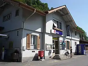 Two-story building with gabled roof