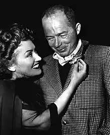 A photograph of Gloria Swanson and Billy Wilder in 1950