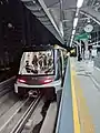 A Gold Line train at Krung Thon Buri station