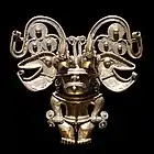 Anthropomorphic pendant; 18th century; gold; height: 13 cm (5.1 in), width: 13 cm (5.1 in), depth: 4.5 cm (1.7 in); Musée du Quai Branly (Paris)