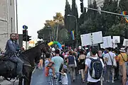 Some soldiers on horseback watching over the Jerusalem Pride Parade in 2012.