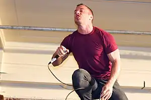 Greg Puciato joined the band in October 2001, after original frontman Dimitri Minakakis left in April.