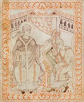 Manuscript drawing of a seated haloed figure in vestments, with a bird on his right shoulder, talking to a seated scribe writing.