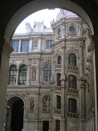 Courtyard with spiraled staircase.