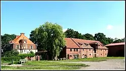 Manor and homestead in the village