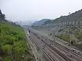 Southern terminus of the standard gauge Kunming–Hekou railway with a metre gauge at the Hekou North railway station before towards to Vietnam.