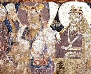 Probable Hepthalite rulers of Tokharistan, with single-lapel caftan and single-crescent crown, in the lateral row of dignitaries next to the Sun God.