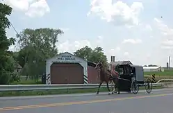 Herr's Mill Covered Bridge and an Amish buggy in Paradise Township