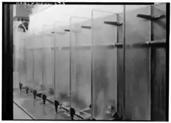 Vintage urinals in Boston secondary school (c. 1933–59)