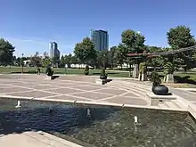 Landscaping includes water works and open lawns. Looking north towards Central City.