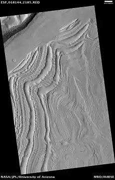 Well-developed hollows of concentric crater fill, as seen by HiRISE under the HiWish program.