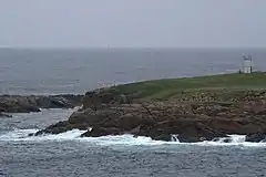 Holm of Skaw The lighthouse above the narrow channel between Holm of Skaw and Inner Flaess.