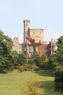 A castellated country house seen from a distance