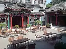 A traditional-style hotel in Beijing.  Some of Beijing's historic siheyuans have been purchased and renovated by hotel chains and now function as hotels.