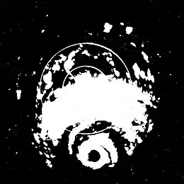 Black and white radar image of a hurricane. Rainbands are visible, as well as the eye, on radar.