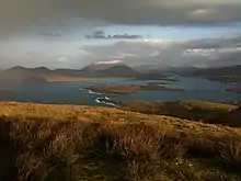 Portion of the view from the summit of Mt. Geokaun ("yo-kawn"). Valentia Harbour and Cahersiveen are in the background