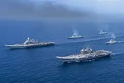 Vikrant  and Vikramaditya with two Kolkata-class destroyer and a Talwar-class frigate.