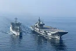 Vikrant  undertaking a replenishment at sea with INS Deepak.