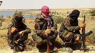 IRPGF fighters resting during the Battle of Tabqa