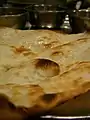 Indian naan baked in the tandoor