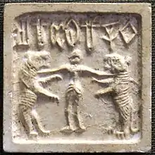 Indus valley civilization seal, with human flanked by two lions (2500–1500 BC).