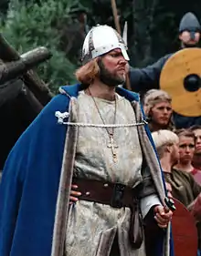 Ingar Helge Gimle wearing a medieval Christian knight's outfit, facing right of camera