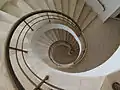 Interior view down spiral staircase tower