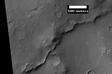 Example of inverted terrain in Parana Valles region, as seen by HiRISE under the HiWish program. Illumination is from the NW.