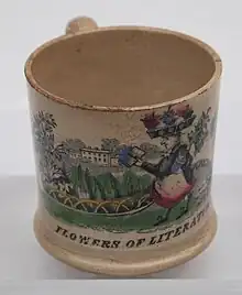 Ironstone cup titled "Flowers of Literature"