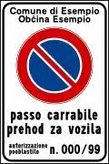 "Passo carrabile" sign in Italian and Slovenian (used in some municipalities of Friuli Venezia Giulia)