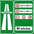 Motorway ahead with a summary of transit restrictions(Formerly used )