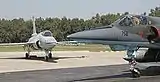 JF-17 background Mirage 5 ROSE foreground